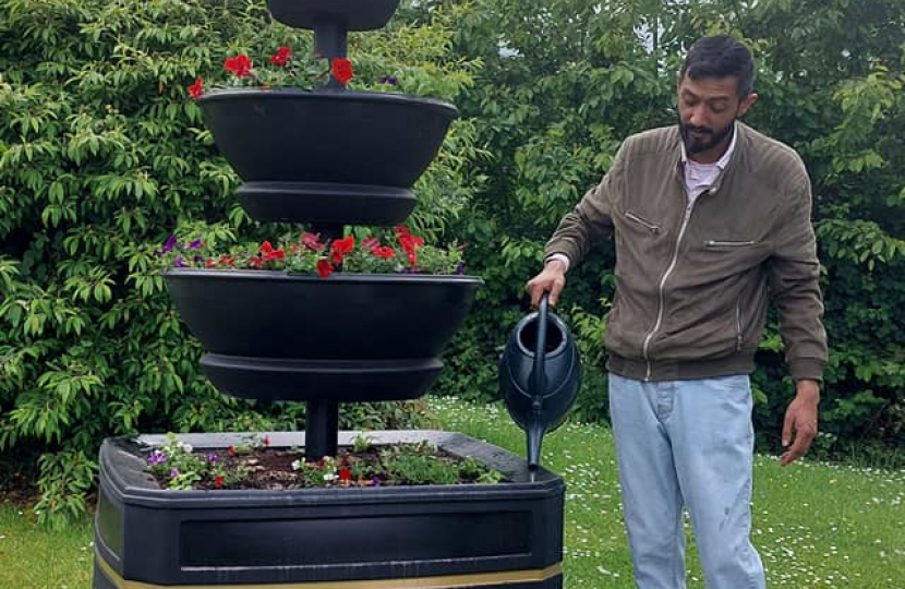 Councillor Kamran Razzaq with one of the new planters