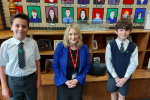 Suzanne Webb MP with the Head Boy and Deputy Head Boy of Greenfield Primary School