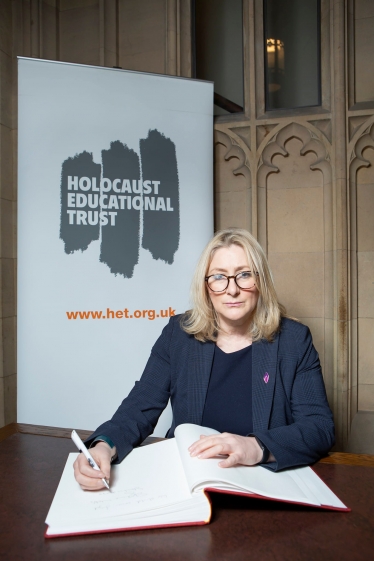 Suzanne Webb MP signing the Holocaust Educational Trust's Book of Commitment