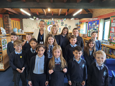 Suzanne Webb MP with the headteacher and pupils