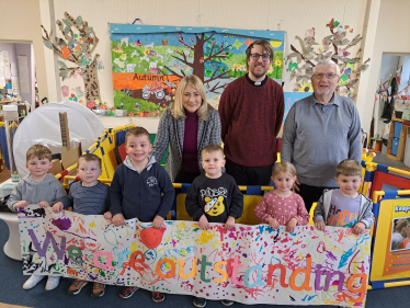 Suzanne with pupils and management