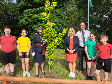 Suzanne Webb MP with Elizabeth Foster, Deputy Lieutenant for the West Midlands Lieutenancy, Headteacher Dominic Simpson, and pupils from Colley Lane Primary Academy